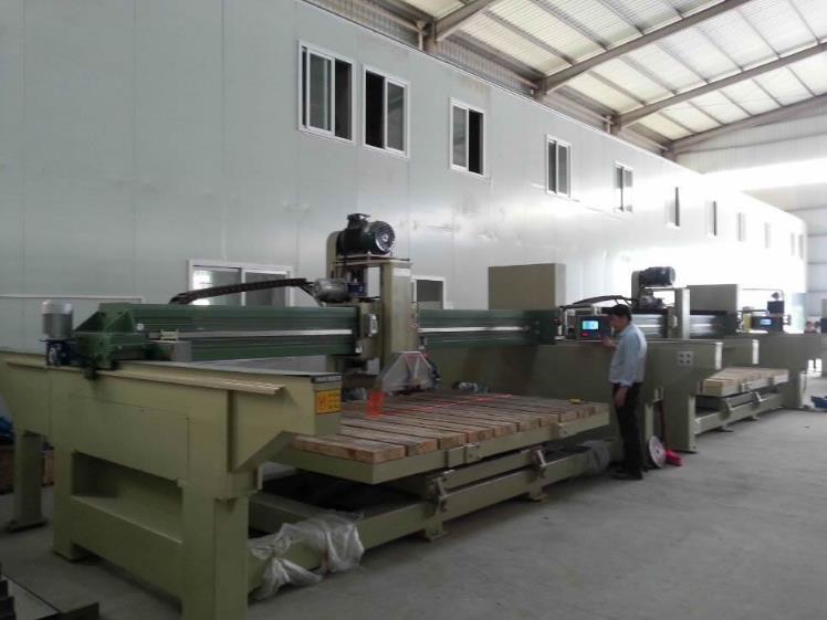 cnc stone cutting machine in factory photo